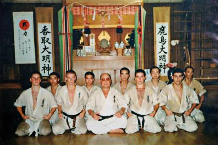 Judd Reid with Sosai Mas Oyama and fellow students in the dojo